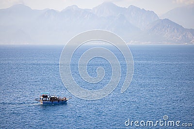 Boat traveling on the sea Stock Photo
