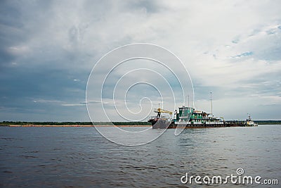 boat view of the river and the ship at sunset Editorial Stock Photo