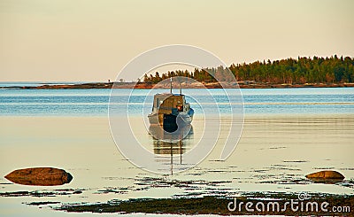 Boat in the village of Rabocheostrovsk, Russia. White Sea Stock Photo