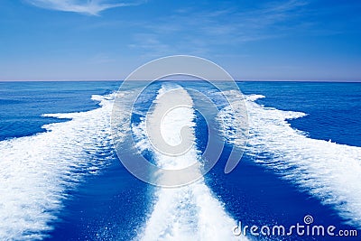 Boat wake prop wash on blue ocean sea Stock Photo