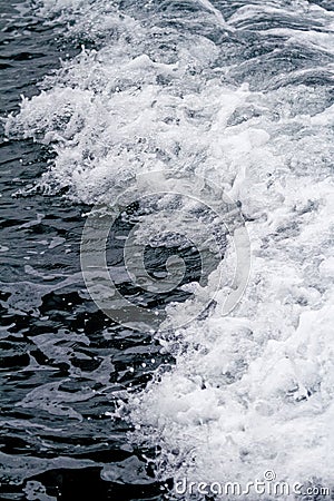 Boat Wave ocean trace on blue sea fresh water background Stock Photo