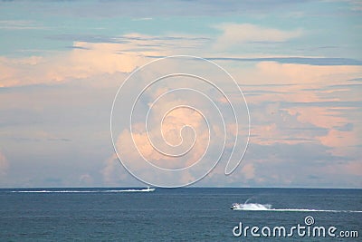 Boat and Waverunner Passing in Opposite Directions Stock Photo