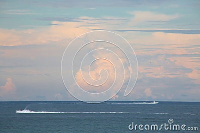 Boat and Waverunner Passing in Opposite Directions Stock Photo