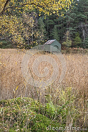 Boathouse & Reeds at Queens Loch in Aboyne, Scotland. Stock Photo