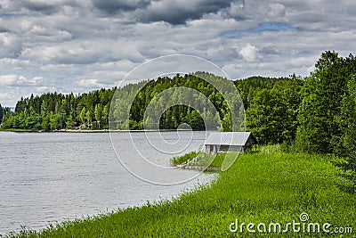 Boathouse on a shore in Sweden Stock Photo