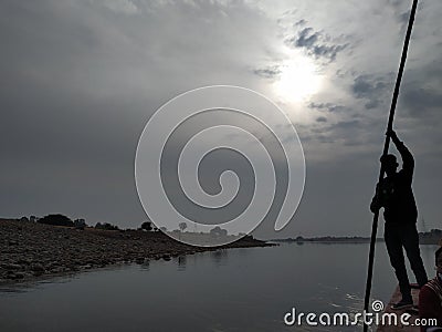 boating at the Chenab river in Akhnoor, on a cloudy day Stock Photo