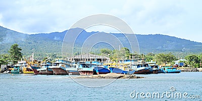 Boats anchored in harbor in Bitung Editorial Stock Photo