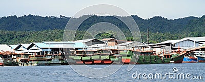 Boats anchored in harbor in Bitung Stock Photo