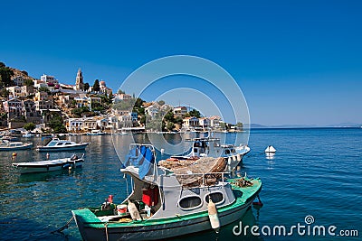 Boats at anchori in the Port of Symi . Stock Photo
