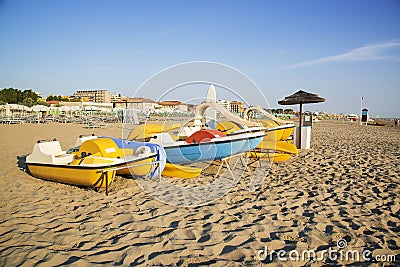 Boats on the beach in Rimini, Italy. Stock Photo