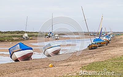 Boats beached at Blakeney Editorial Stock Photo