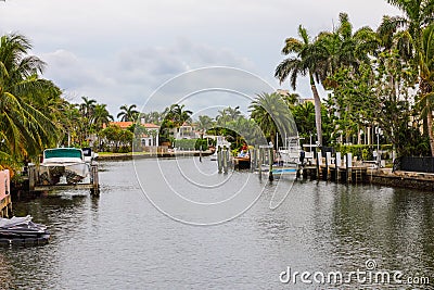 Boats on a canal Miami Beach palm trees Stock Photo