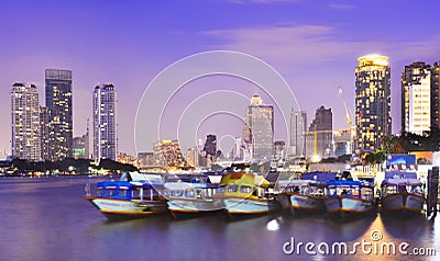 Boats cruising on the Chao Praya River in Bangkok, Thailand. Editorial Stock Photo