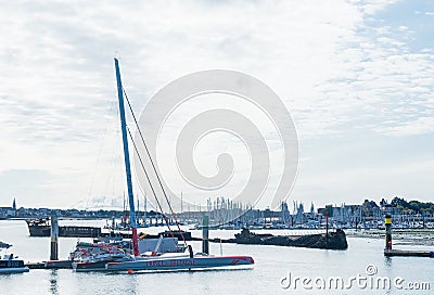 Boats docked at the marina of Keroman-La Base. On the background - Le Crapaud and the Regensburg wreck. Lorient, Brittany Editorial Stock Photo