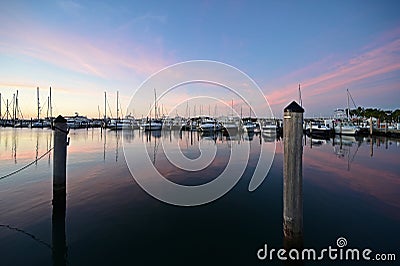 Boats docked in marina in Miami, Florida at sunrise. Stock Photo