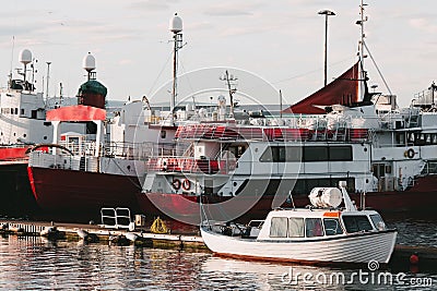 boats floating on water in harbour, Reykjavik, Iceland Editorial Stock Photo