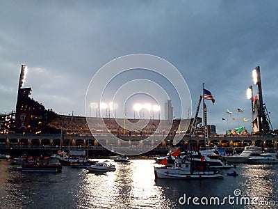 Boats and Kayakers in McCovey Cove and Ballpark at night Editorial Stock Photo