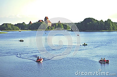 Boats in lake near Trakai castle Editorial Stock Photo