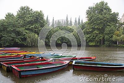 Boats ,lake and plant at raining day Stock Photo