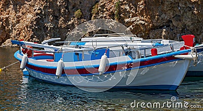 Boats on Lake Voulismeni, Agios Nikolaos, Crete, Greece Stock Photo