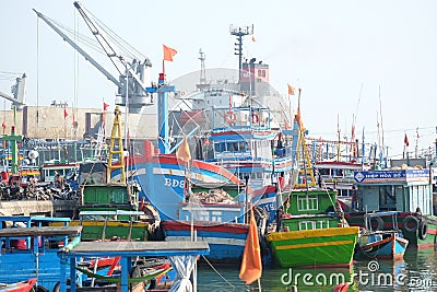 Boats and Lifestyle at Qui Nhon Fish Port, Vietnam in the morning. Editorial Stock Photo