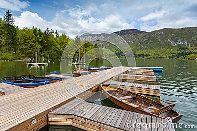 Boats in marina at Bohinj Lake, Julian Alps Stock Photo
