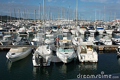 Boats moored at the Ibiza tourist pier in the summer Editorial Stock Photo