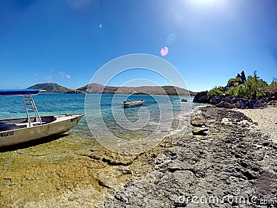 Boats moored at the Sawa-i-lau Caves in Fiji Stock Photo