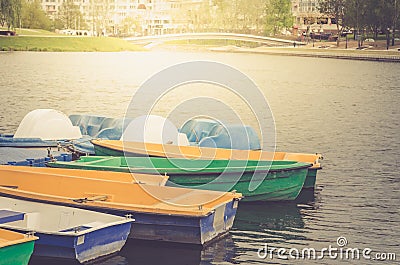 Boats on the mooring on the lake/walking boats on the lake Stock Photo