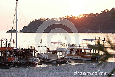 Boats parked at the habor during sunset. Editorial Stock Photo