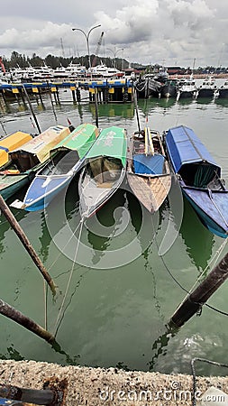 boats parked neatly in the harbour Stock Photo