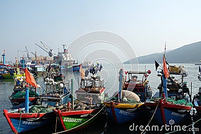 Boats at Qui Nhon Fish Port, Vietnam in the morning. Editorial Stock Photo
