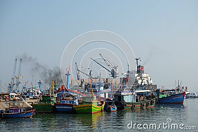 Boats at Qui Nhon Fish Port, Vietnam in the morning. Editorial Stock Photo