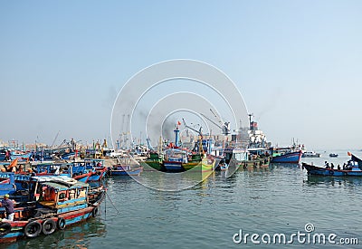 Boats at Qui Nhon Fish Port, Vietnam in the morning. Editorial Stock Photo