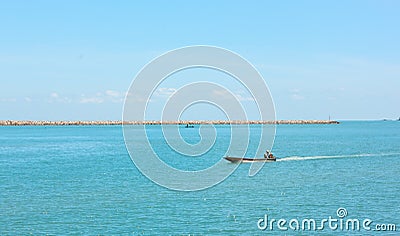 boats are sailing on the sea background in the noon time. Stock Photo