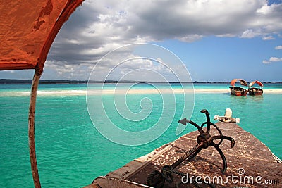 Boats on sunny sand bank Stock Photo