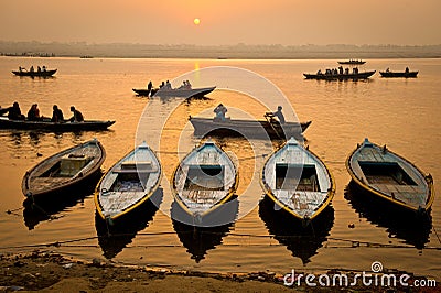 Boats in the sunrise - Varanasi, India Editorial Stock Photo