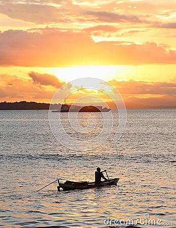 Boats on sunset sea Stock Photo