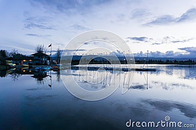 Boats after sunset at Shoreline Lake Park, Mountain View, Silicon Valley, San Francisco bay, California Stock Photo