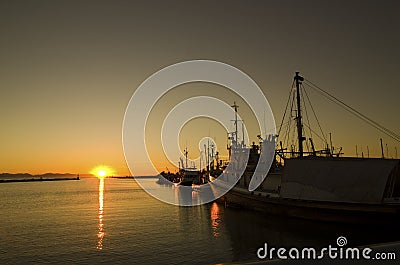 Boats at Sunset Stock Photo