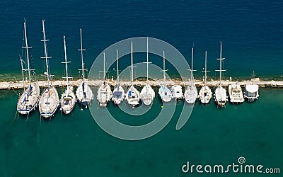 Boats tethered in harbour in Corfu Stock Photo