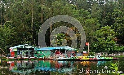 Boats are waiting for tour people at kodaikanal boat house at early morning with reflections. Editorial Stock Photo