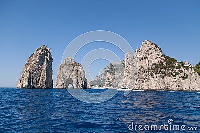 Faraglioni, the natural arches of Capri, Italy Stock Photo