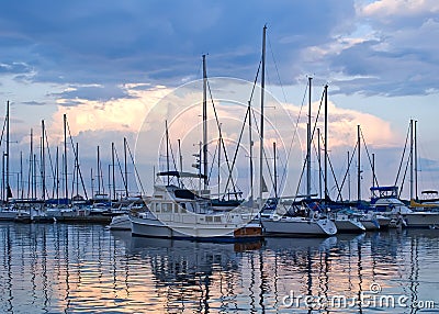 Boats and yachts moored in harbor Stock Photo