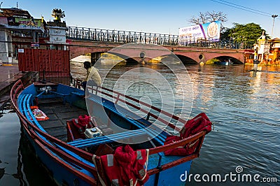 Boatsman sitting on a boat on the river ganga Editorial Stock Photo