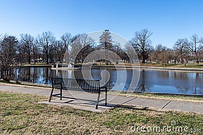 Bob Noble Park in Paducha Kentucy in the winter. Bench and pond shown Stock Photo