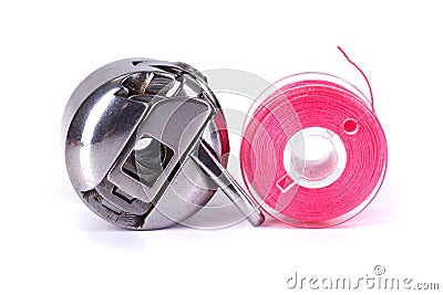 Bobbin case and plastic bobbin Stock Photo