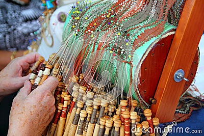 Bobbin laze openwork fabric using a pillow Stock Photo