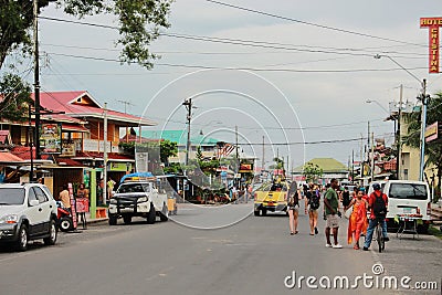 Bocas del Toro, PanamÃ¡ - August, 10th of 2014: Tourists and travelers enjoy a walk close to Bocas del Toro city waterfront brs. Editorial Stock Photo