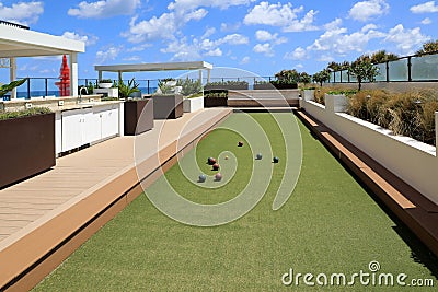 Bocce ball on an outdoor oceanfront terrace. Stock Photo